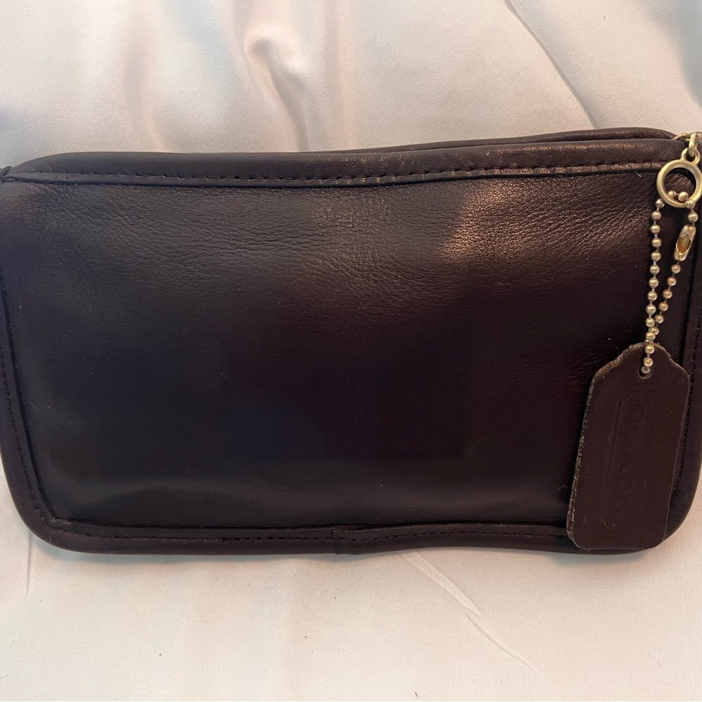 Coach 90’s mahogany leather Chunky Case. 7.5 x 4.5 x 1. Brass chain with tag.